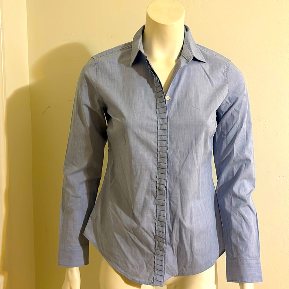 Button down shirt with ruffle on the placket
